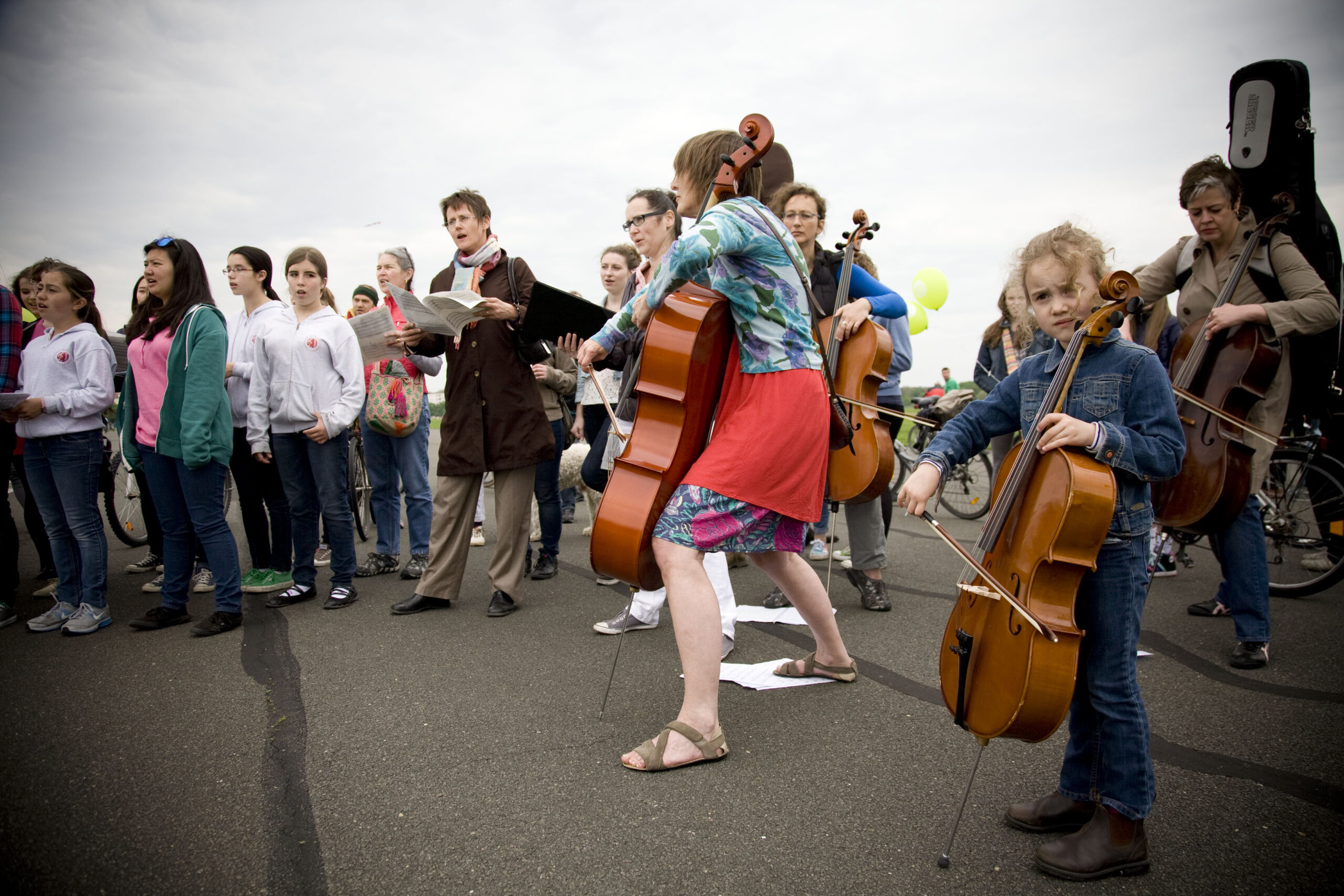 Musicians of all ages performing outdoors